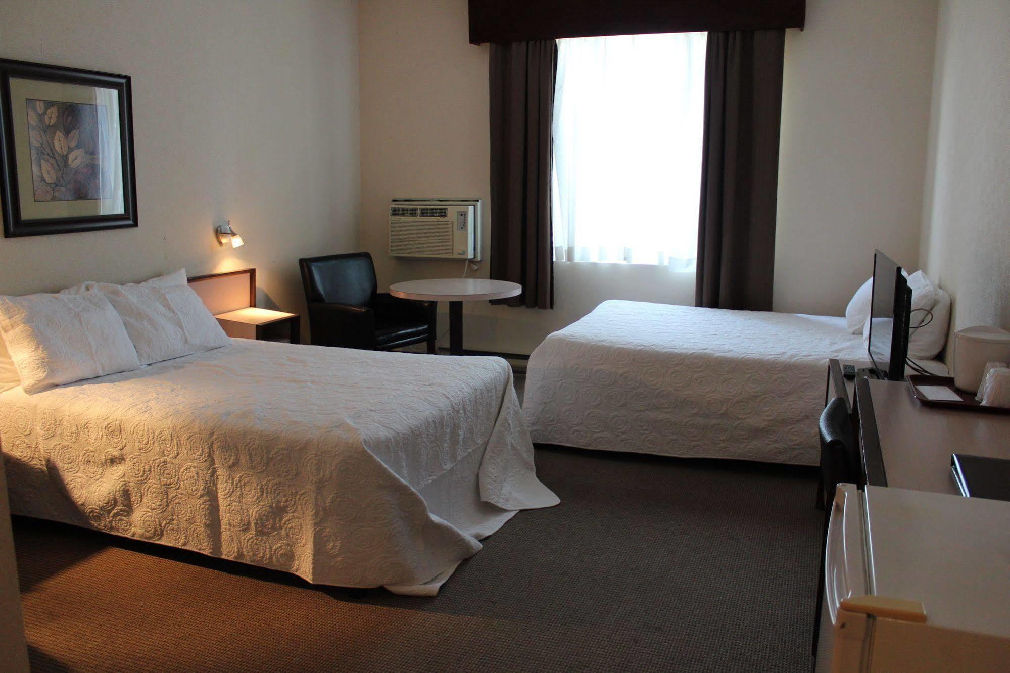 Motel Capri Et Suites Repentigny Exterior foto